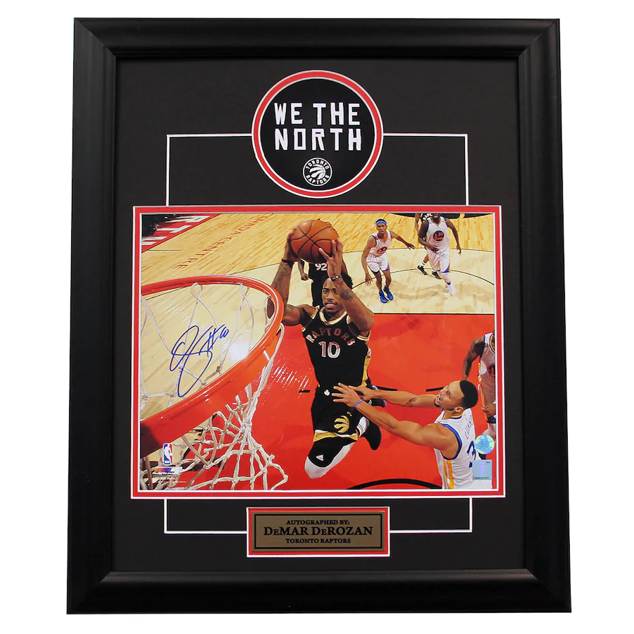 Demar Derozan Toronto Raptors Autographed Netcam Dunk Over Curry 19x23 Frame