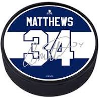 PLAYER PUCK - TORONTO MAPLE LEAFS A MATTHEWS 34